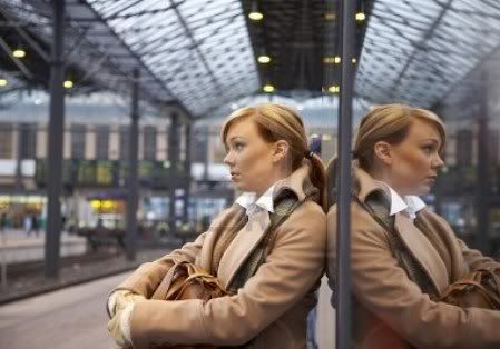 Woman waiting for a train, A Crazy Train?!No, just a train.