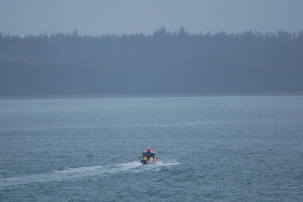 Ranger leaving cruise ship on small boat