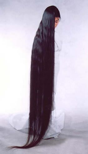 http://i266.photobucket.com/albums/ii275/rOoxroz/20080112-woman-with-very-long-hair.jpg